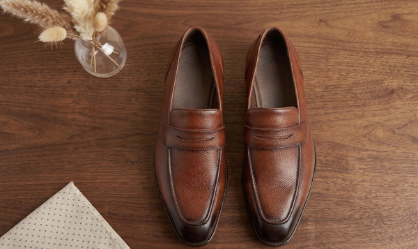 Brown leather textured severino slip on  penny loafers