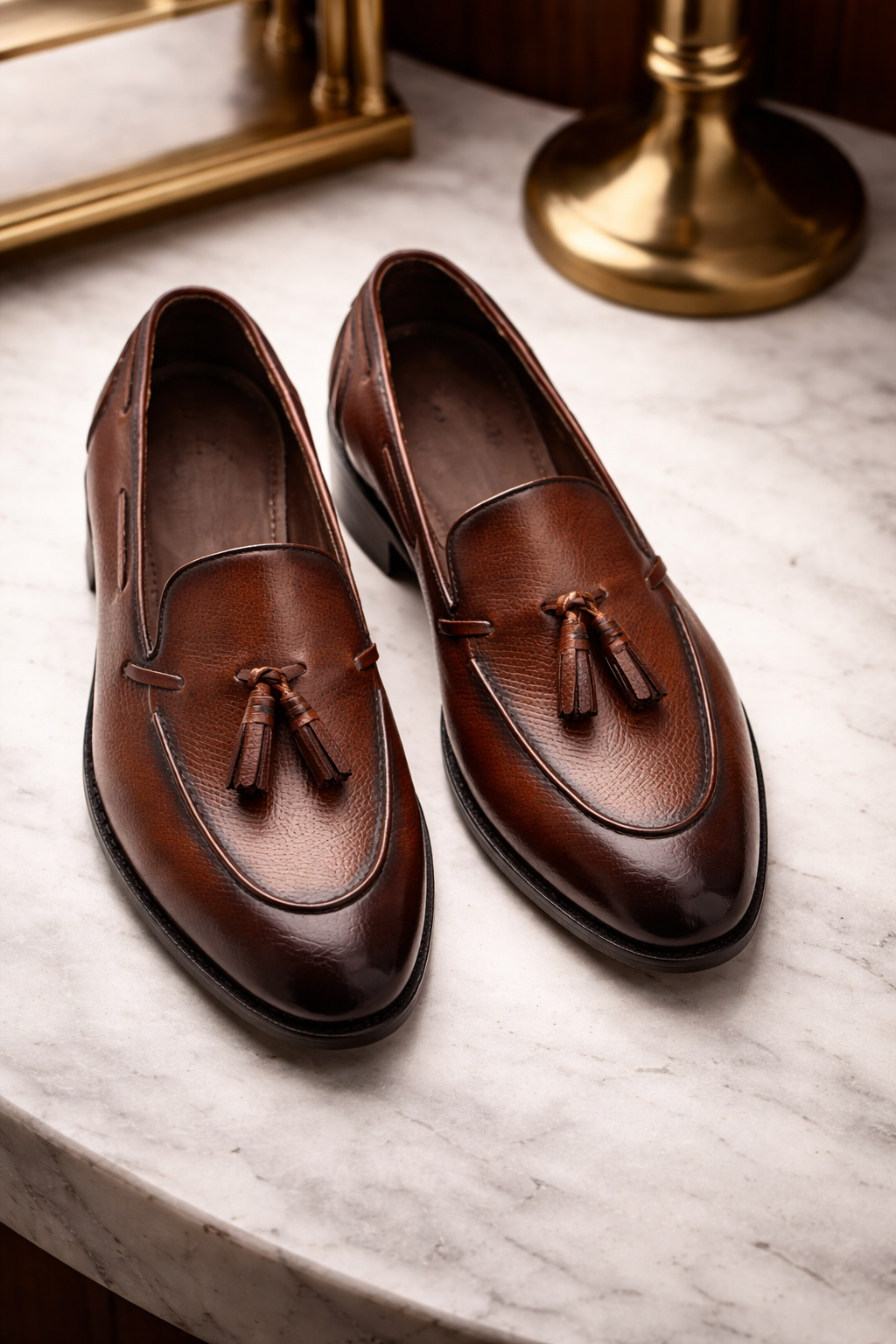 Brown leather textured raging slip On tassel penny loafers