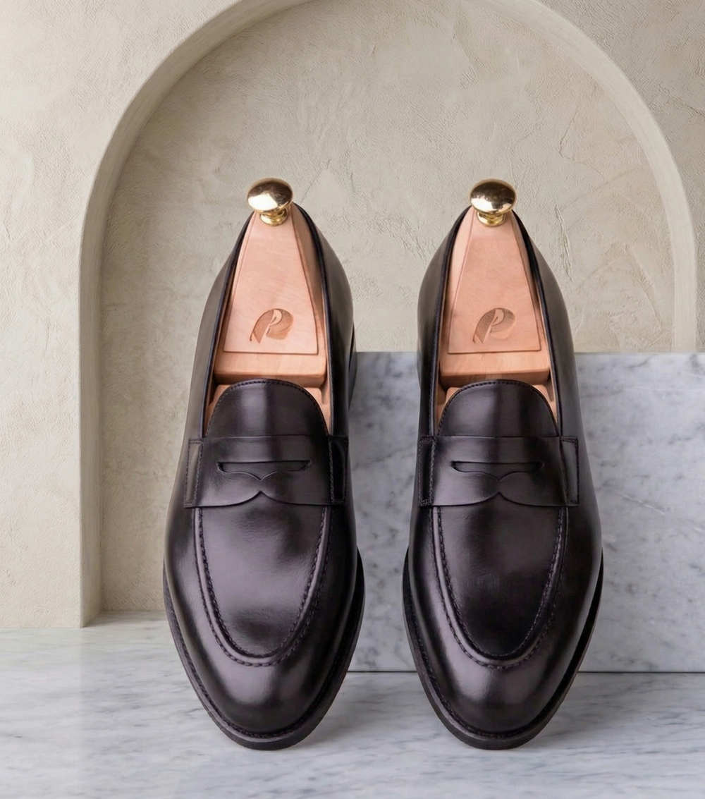 Black leather tumbled penny loafers 