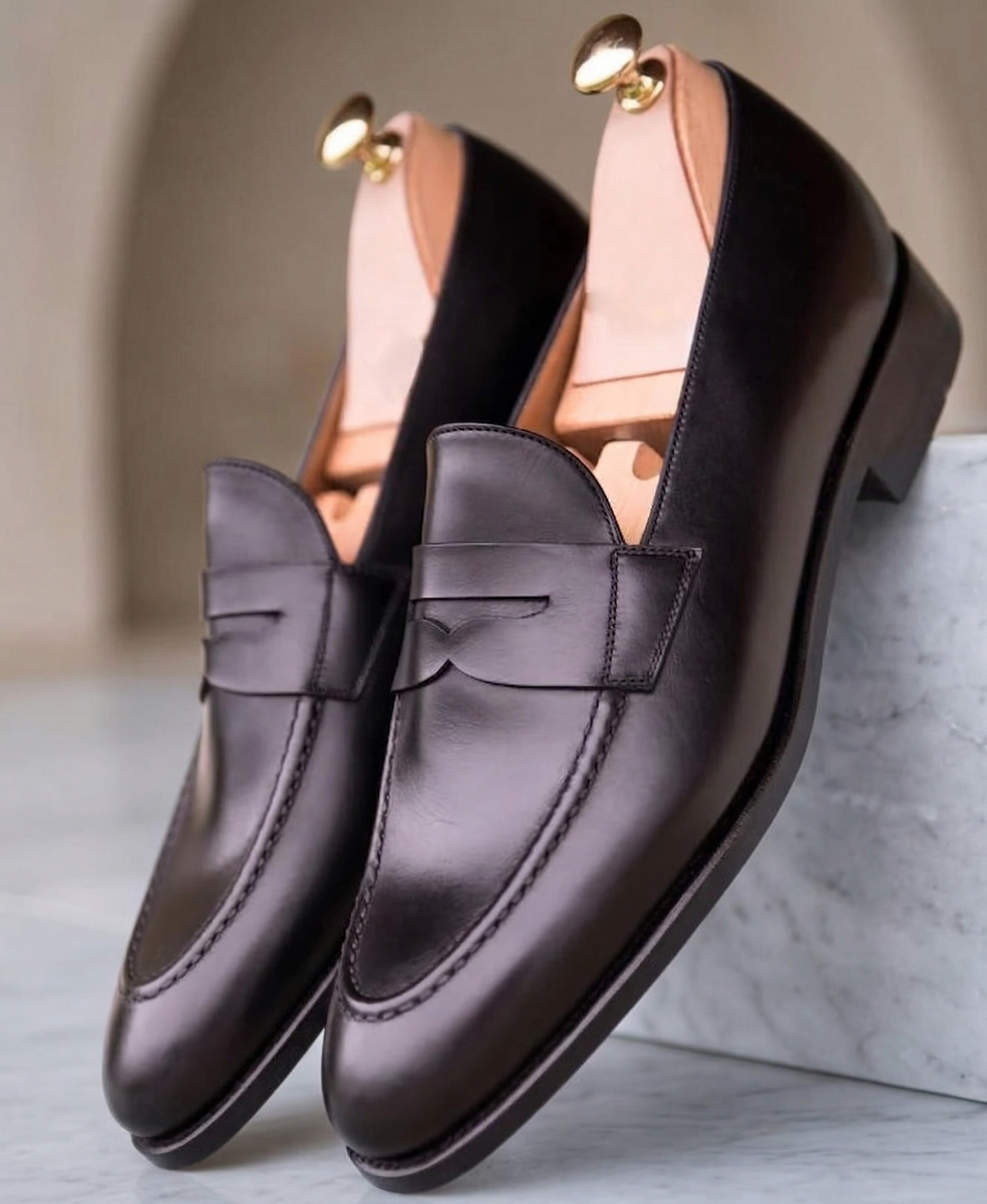 Black leather tumbled penny loafers 