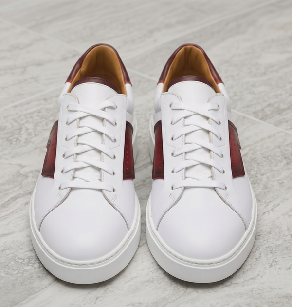 Red and white low top sneaker